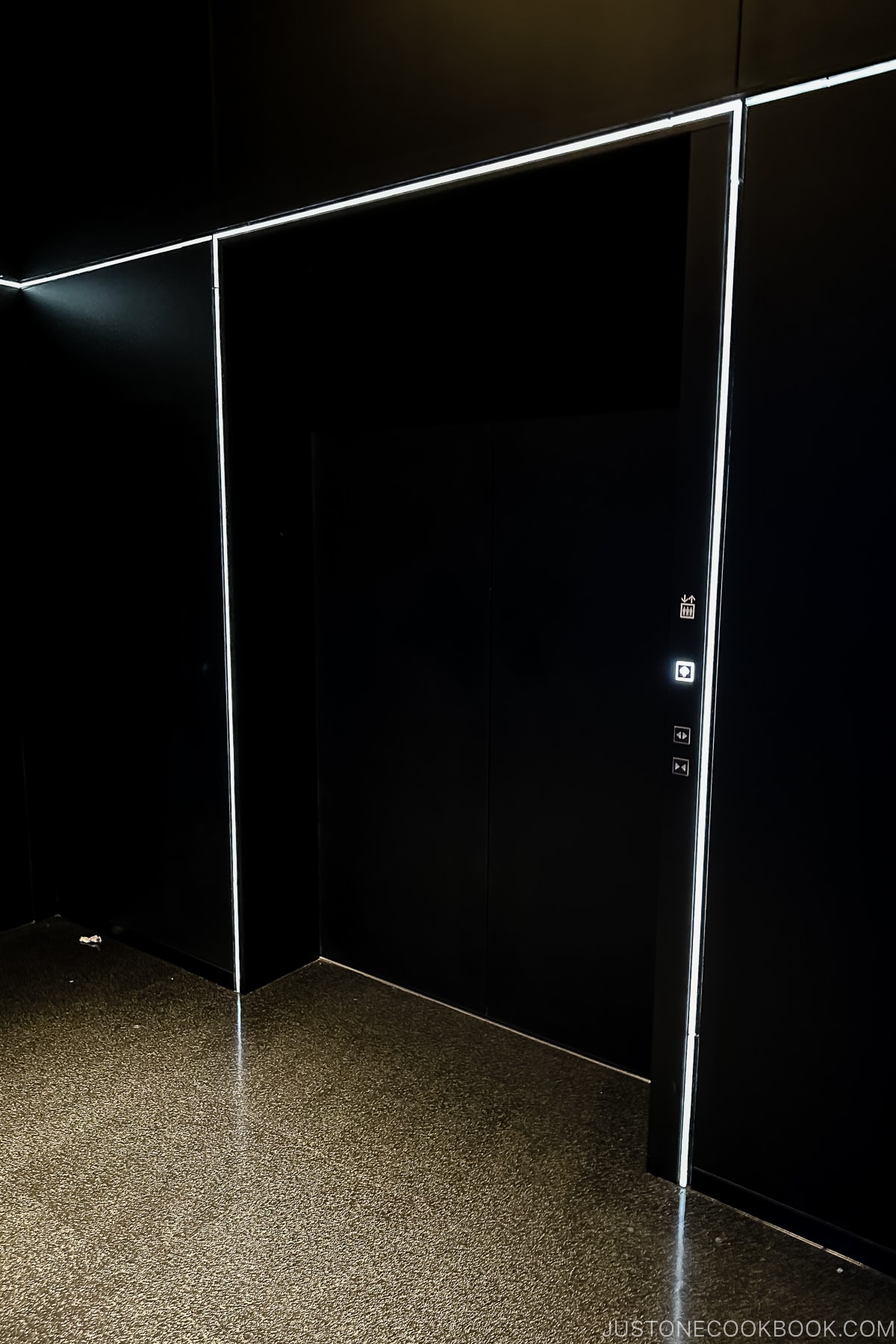 black elevator with neon lights