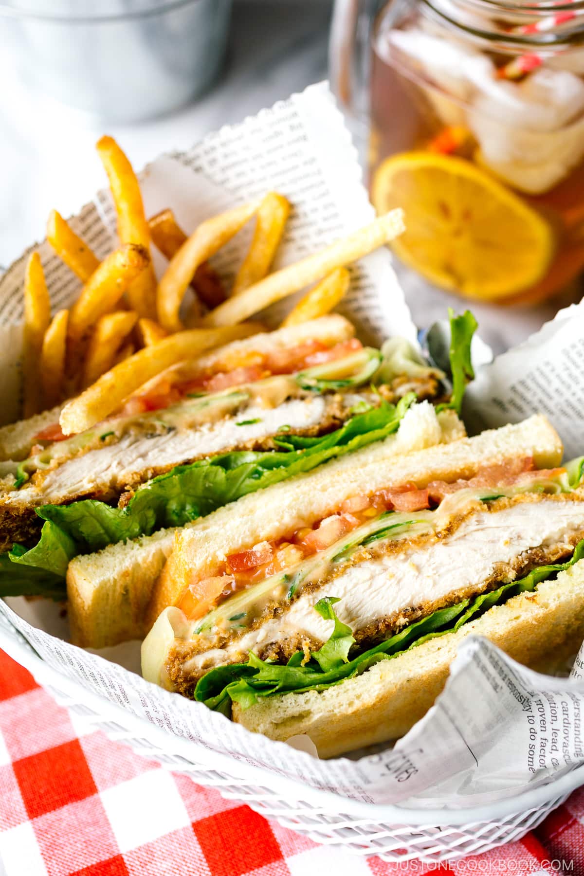 A basket containing Crispy Chicken Sandwich and french fries.