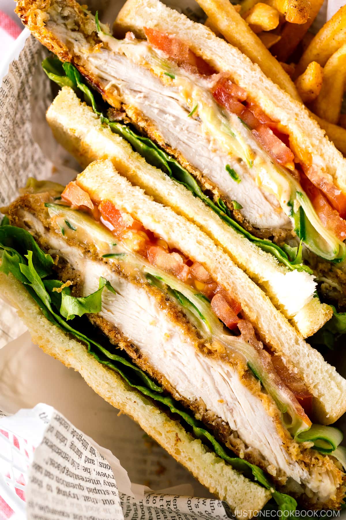 A basket containing Crispy Chicken Sandwich and french fries.