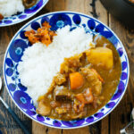 Ceramic bowls containing Japanese Tomato Curry with steamed rice.