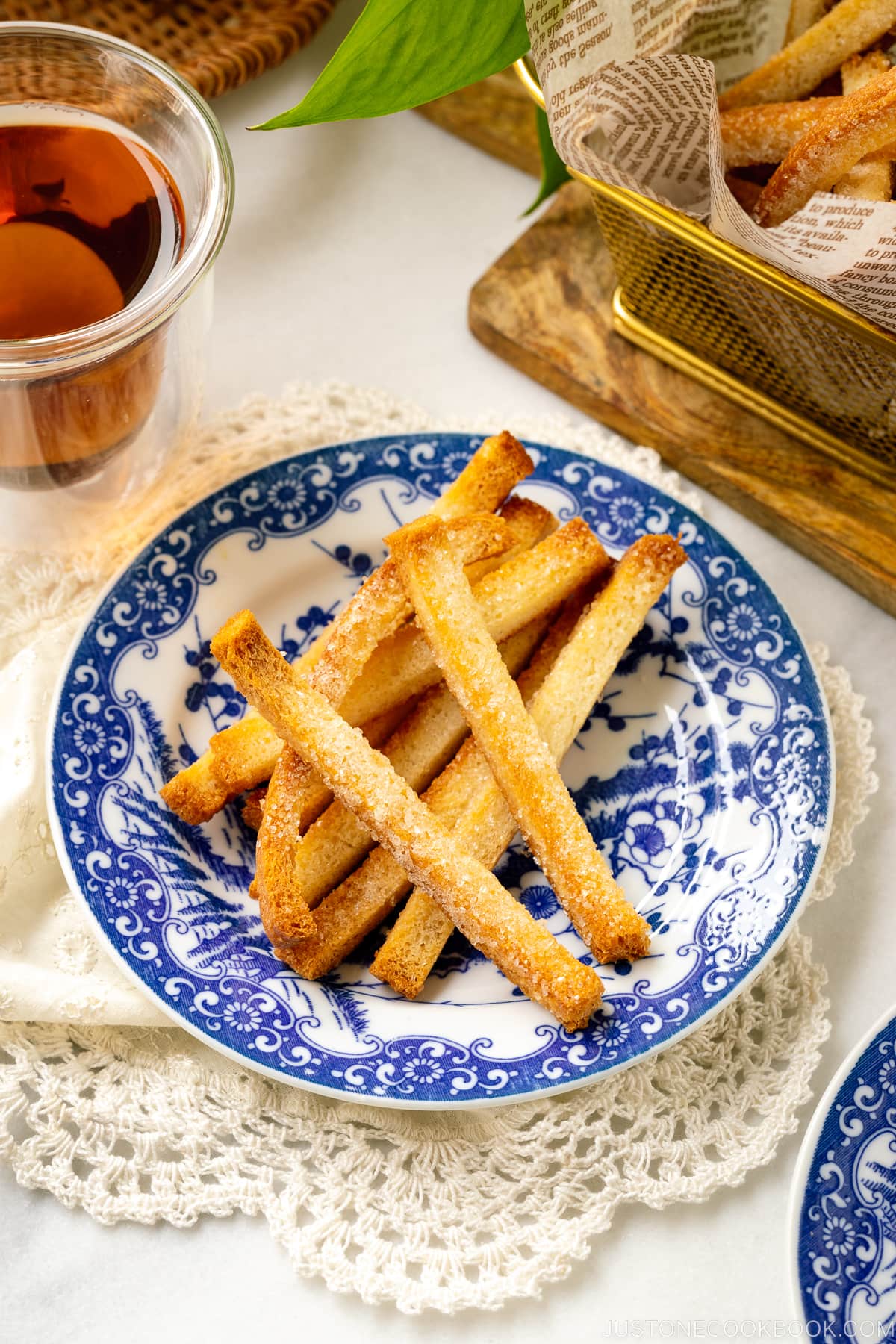 A blue plate containing oven baked Shokupan Crust Rusks.