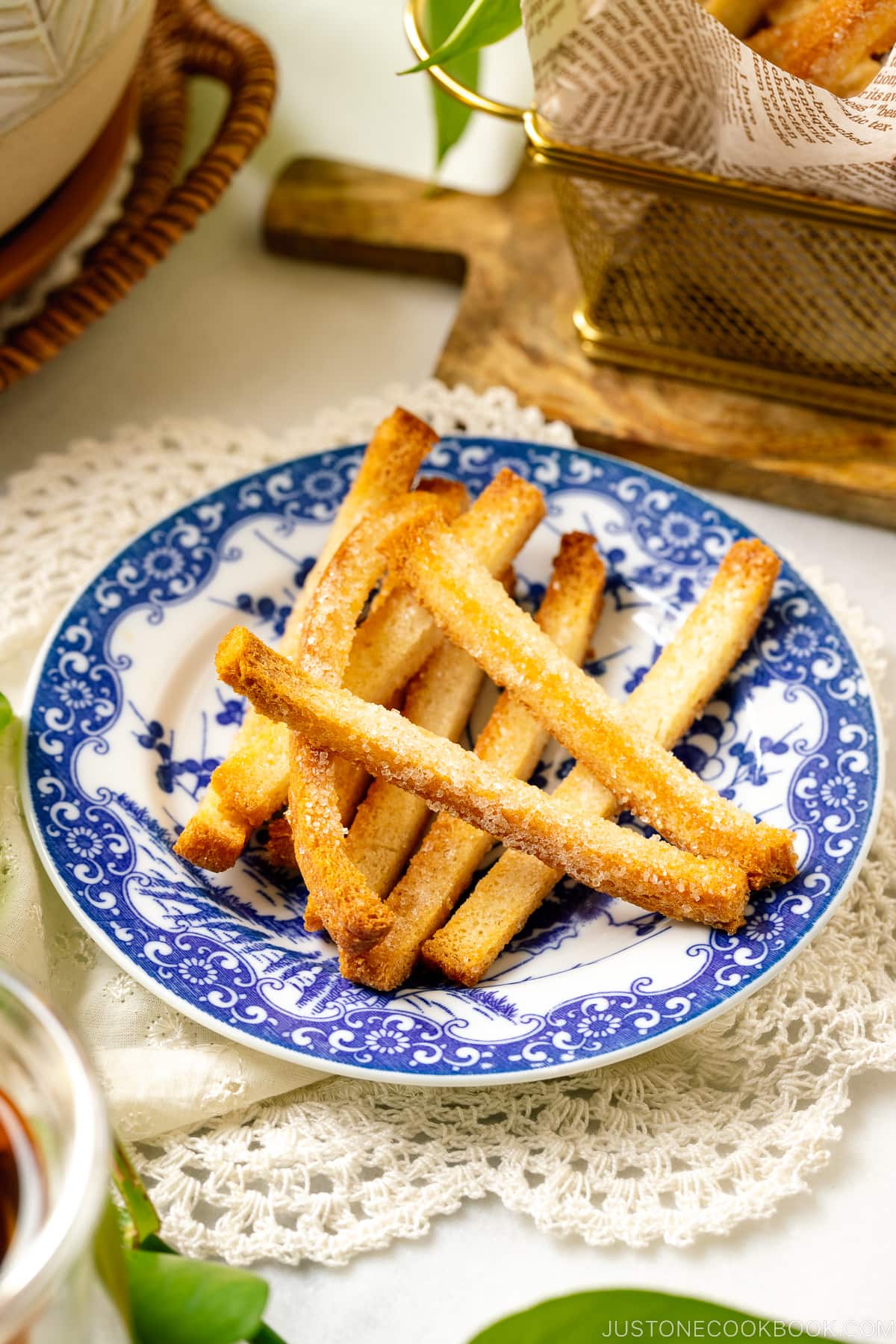 A blue plate containing oven baked Shokupan Crust Rusks.