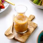 A glass jar containing homemade Miso Dressing.