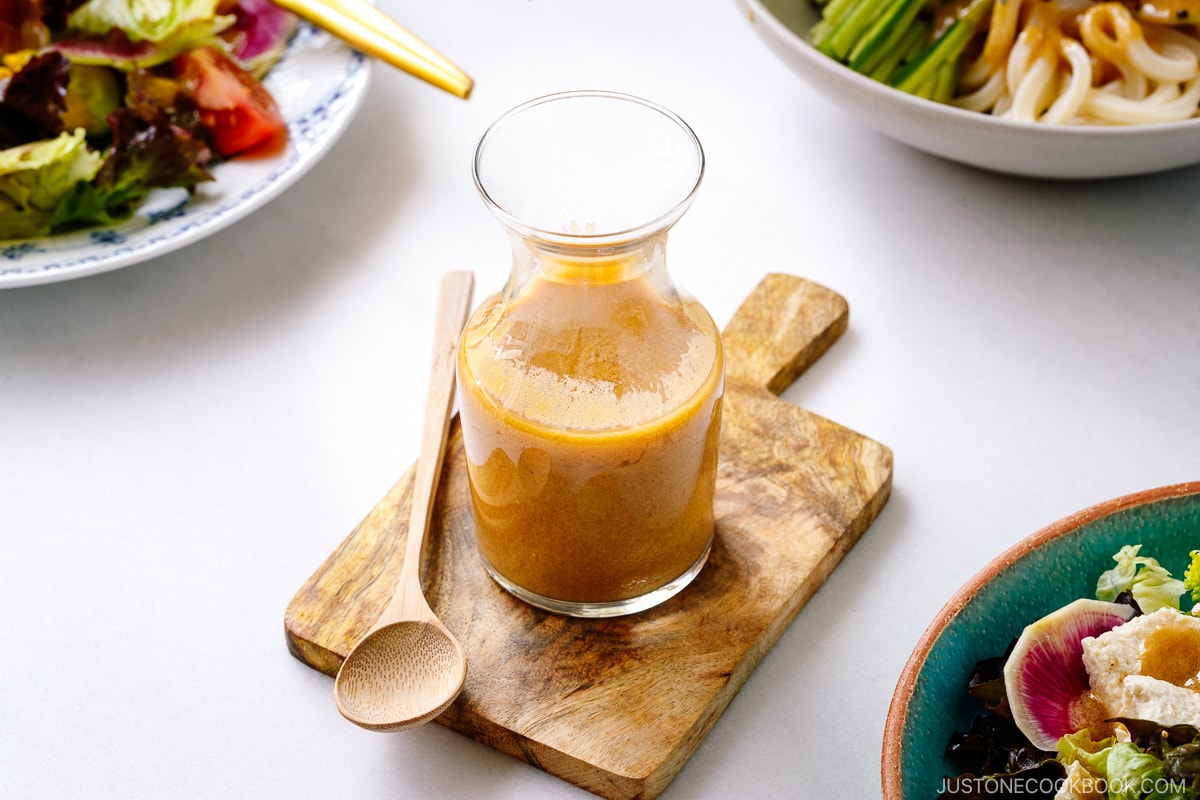 A glass jar containing homemade Miso Dressing.