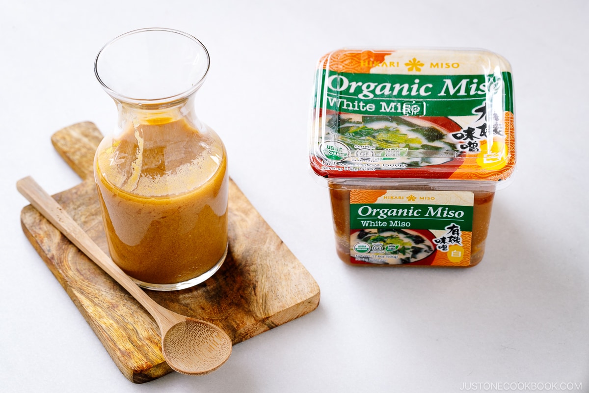 A glass jar containing homemade Miso Dressing.