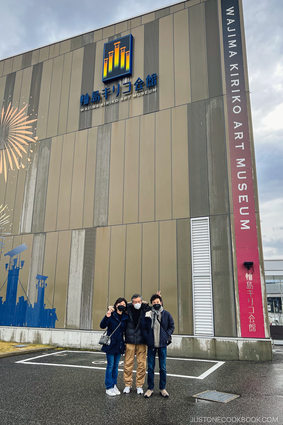 three people standing in front of Wajima Kiriko Art Museum