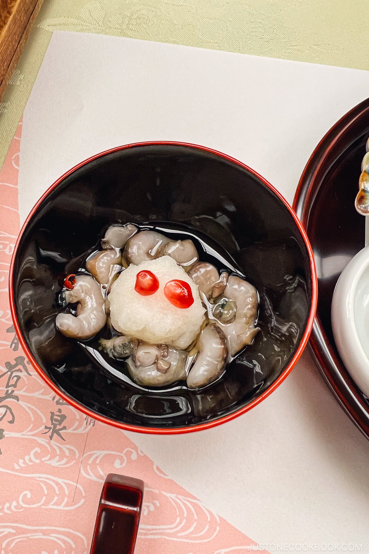 sea cucumber in a lacquer bowl