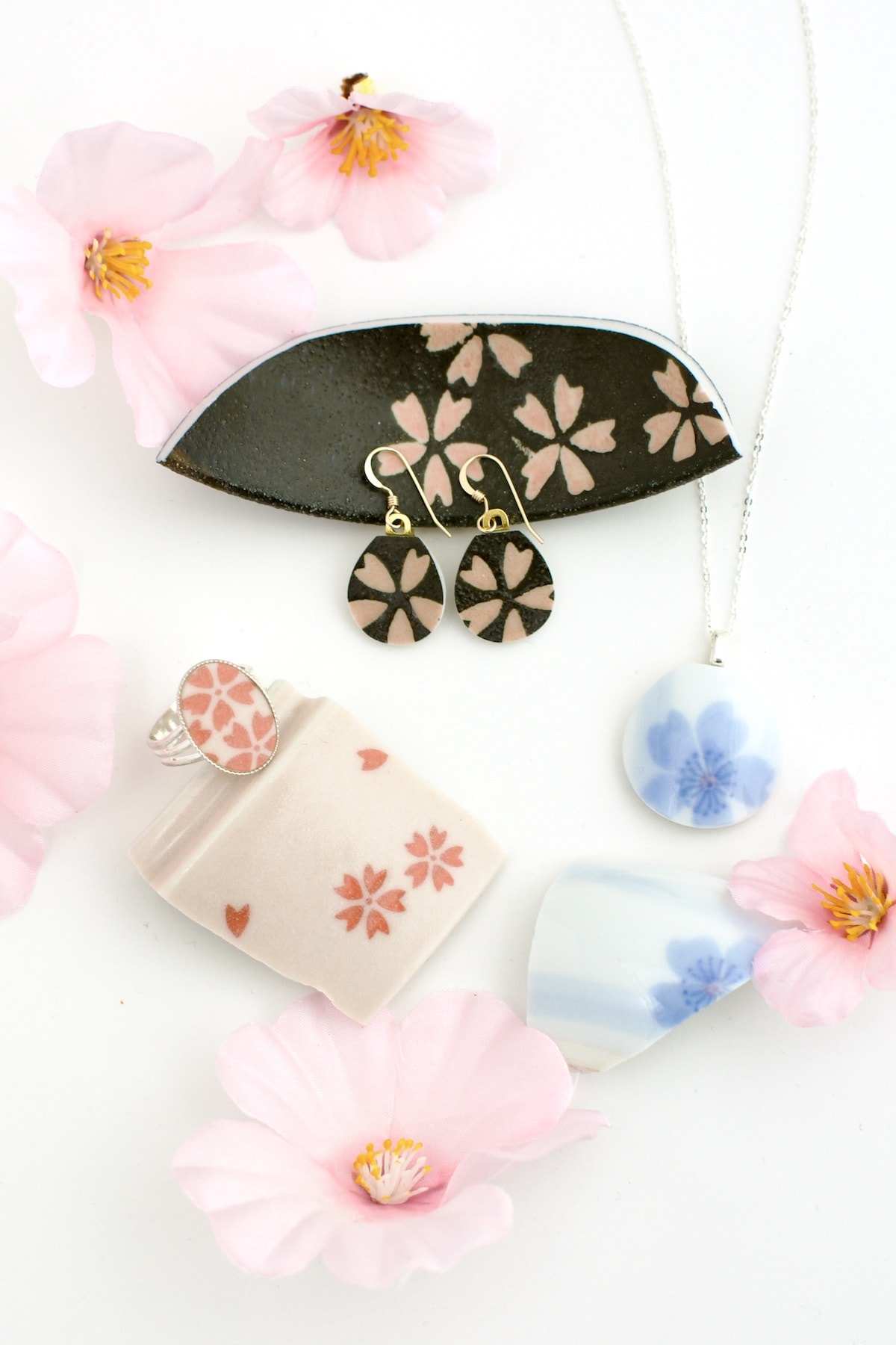 a collection of sakura series jewelry