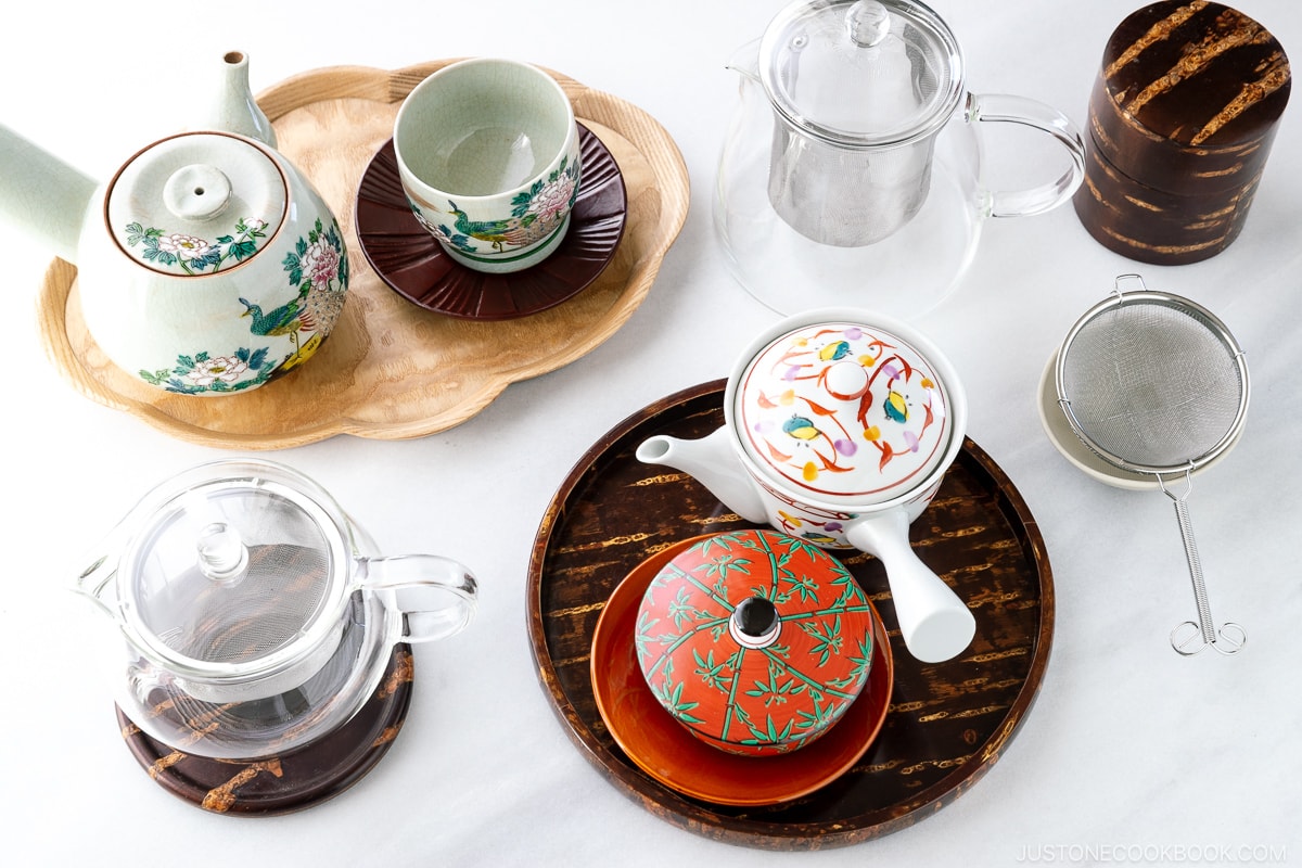 various teapots for making tea on a marble table