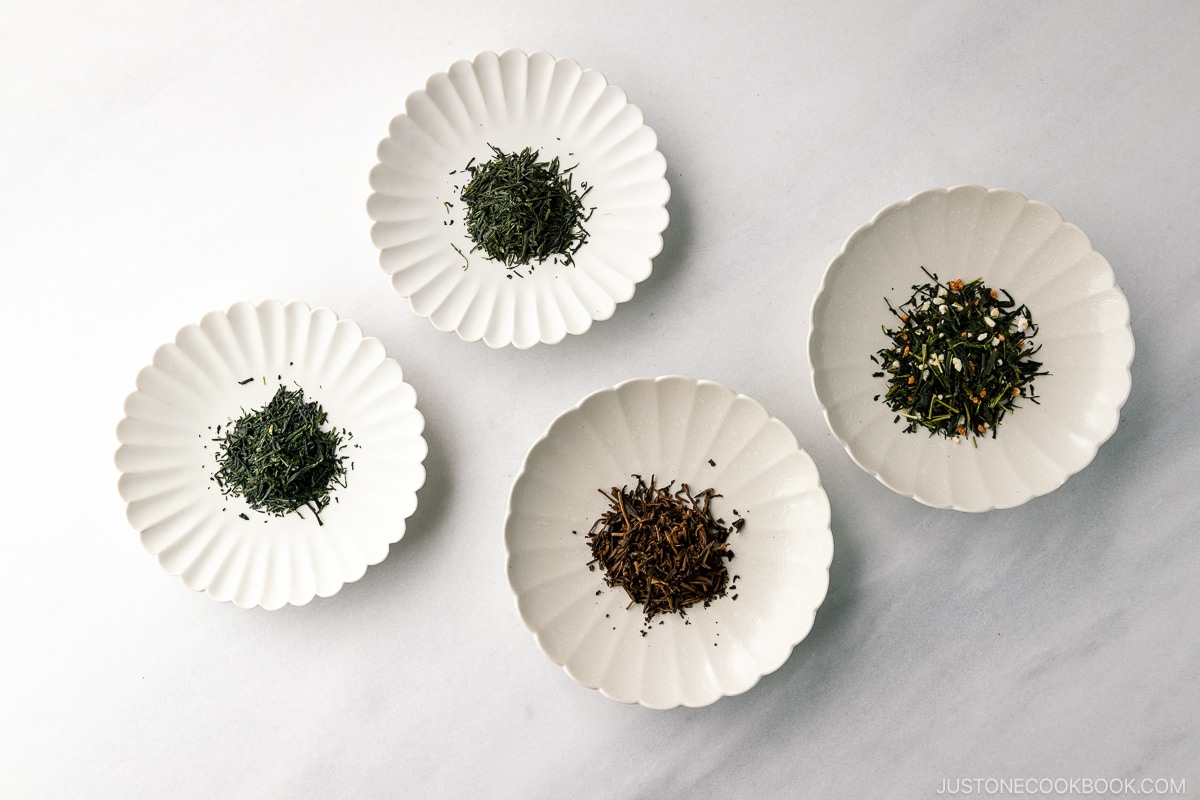 4 types of Japanese green tea leaves on a marble table
