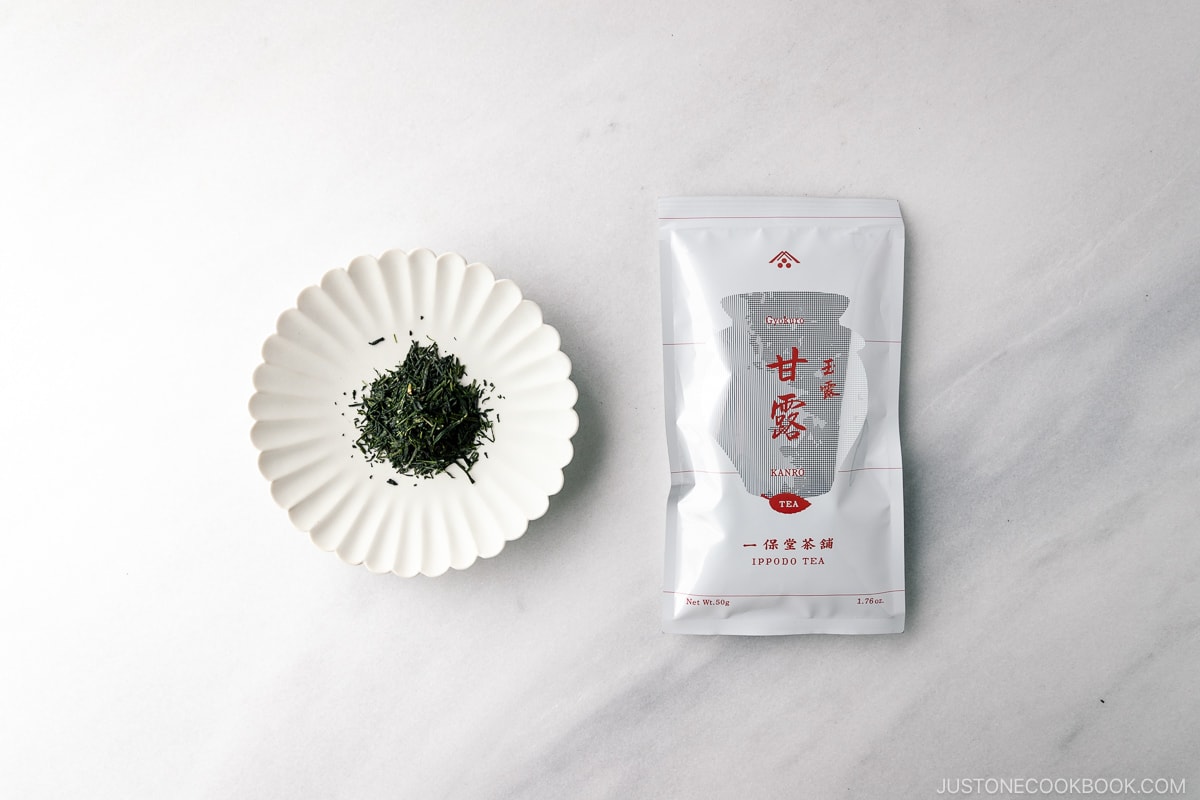 Kanro green tea leaves on a marble table