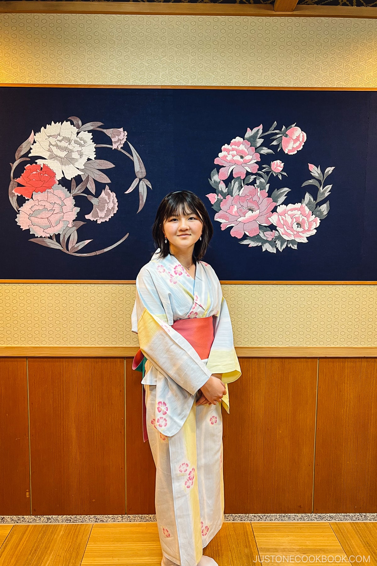 a girl in traditional Japanese bath rob