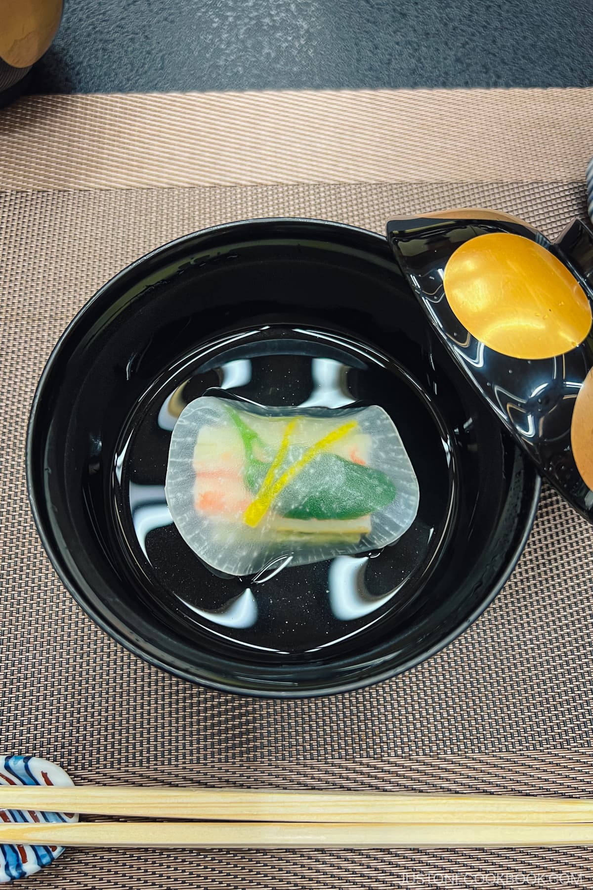 a delicate appetizer in a traditional lacquer bowl