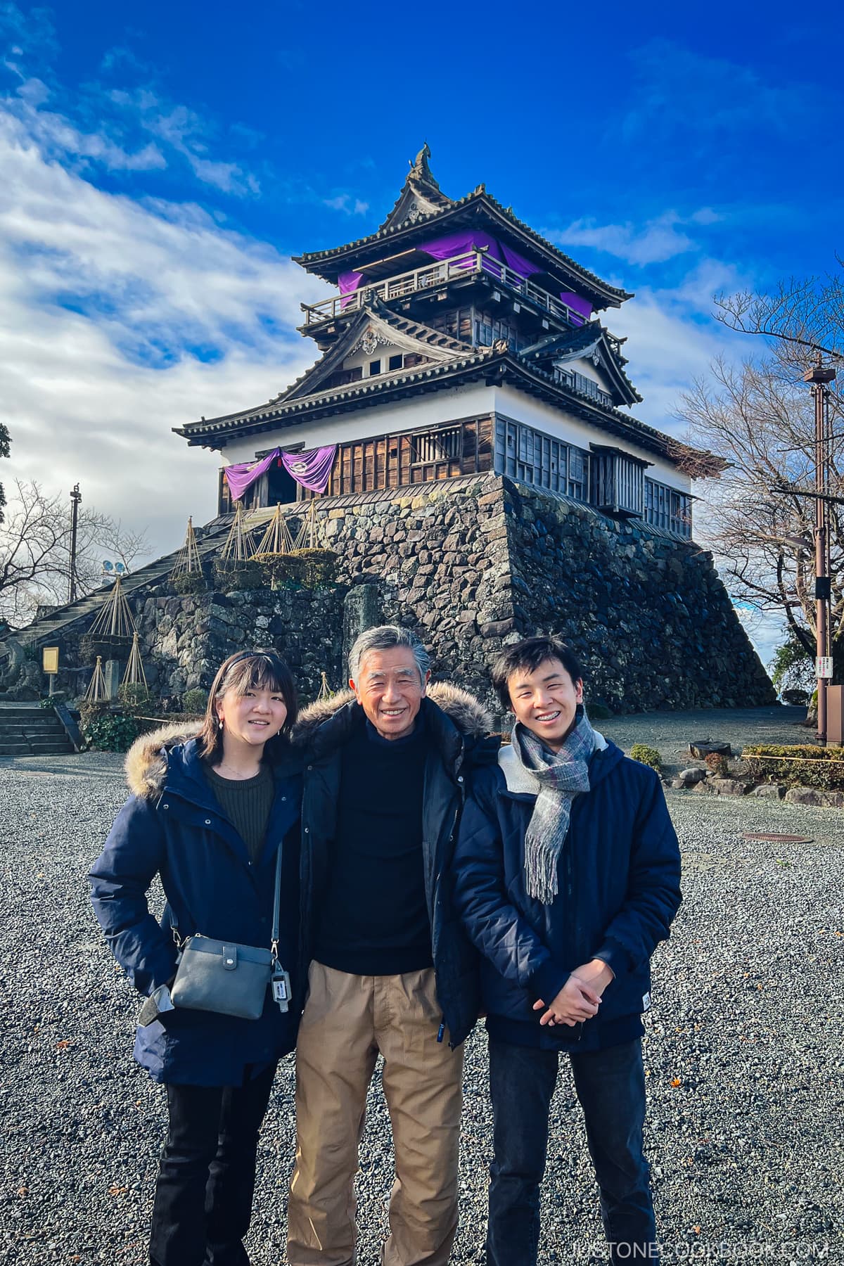 3 people in front of Maruoka-jo Castle