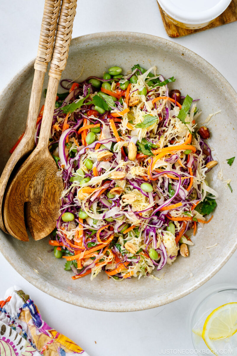 A large salad bowl containing Asian Cabbage Salad.