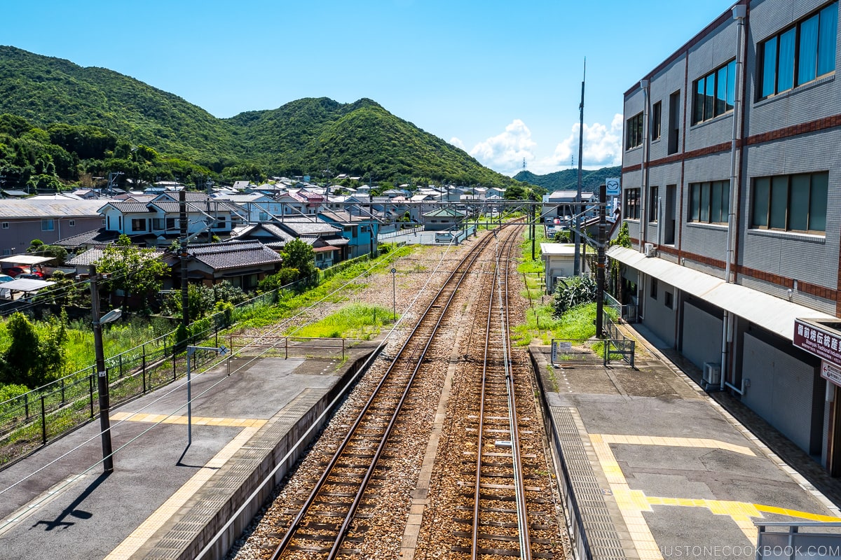 train tracks near mountains