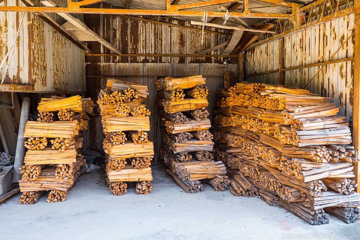 stacks of pine wood inside a warehouse