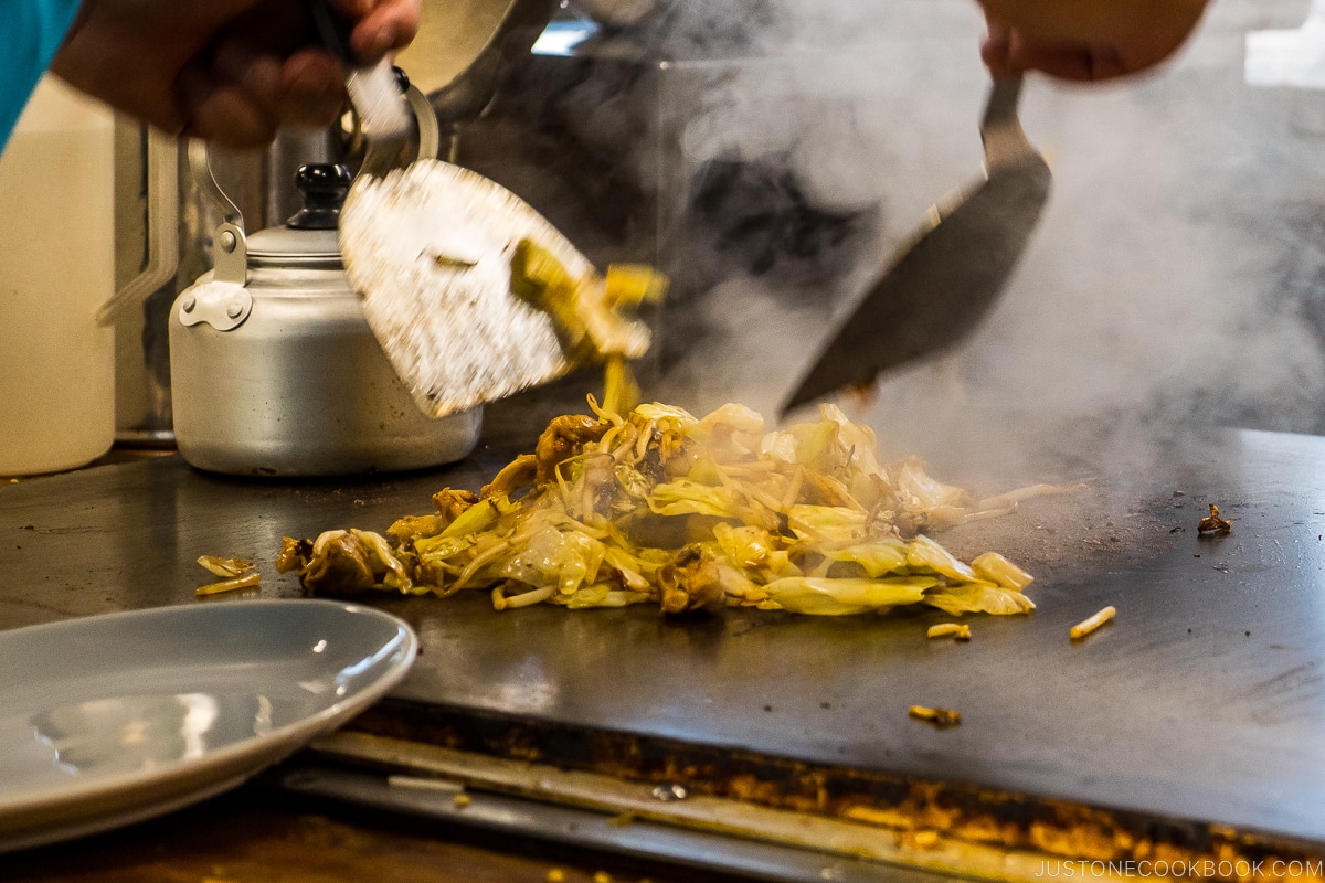 food being cooked on a hot plate