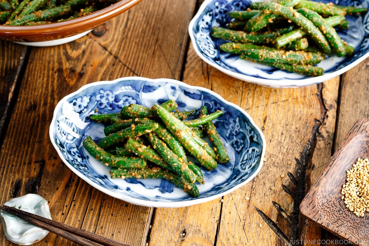 Blue and white Japanese bowls containing Green bean Gomaae.