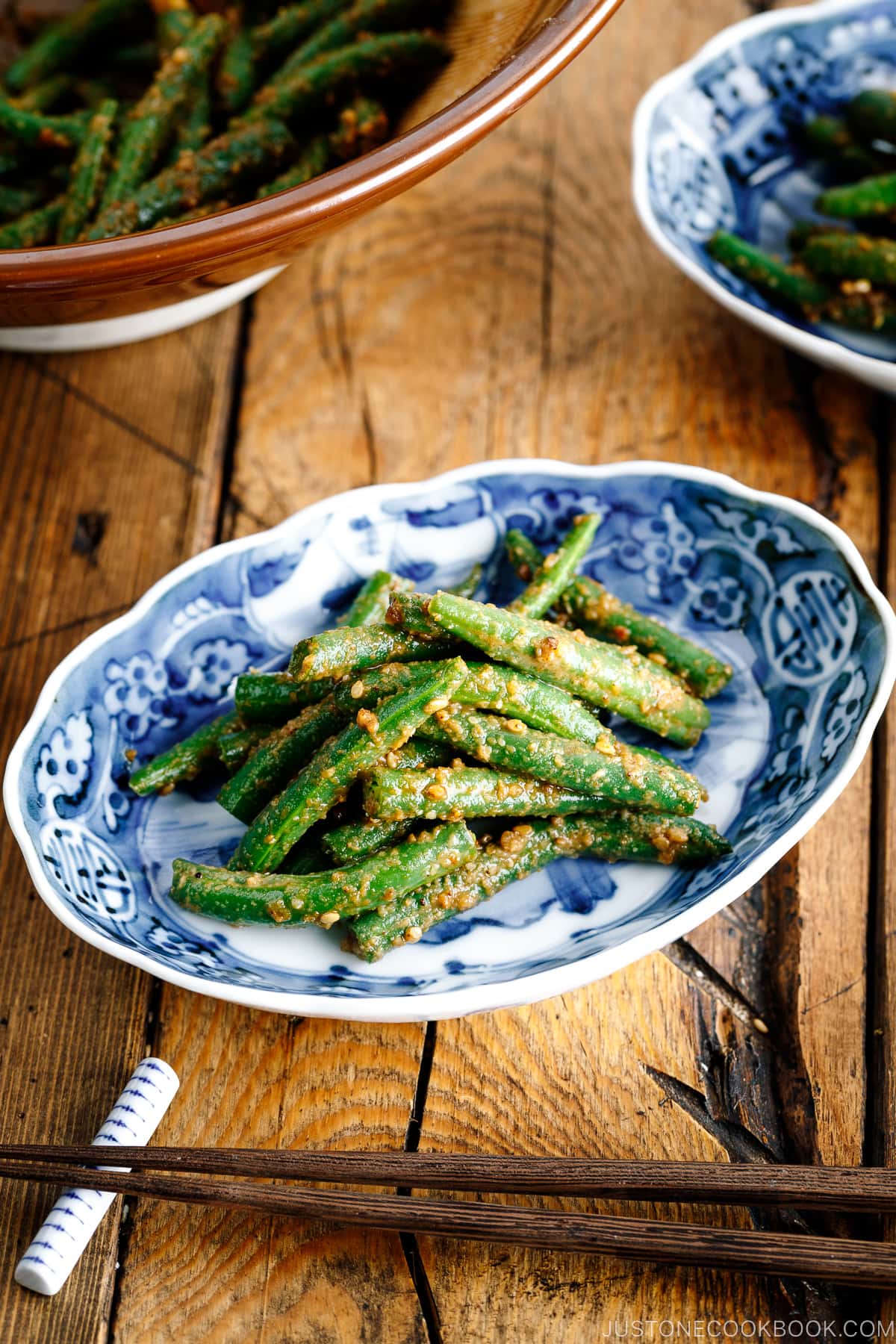 Blue and white Japanese bowls containing Green bean Gomaae.