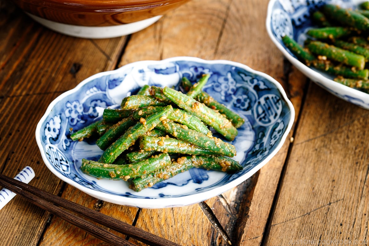 Blue and white Japanese bowls containing Green bean Gomaae.