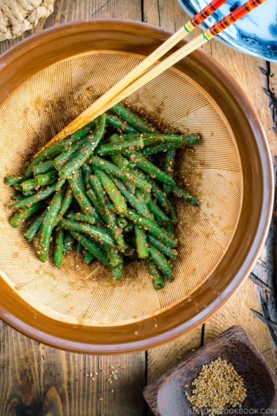 Blue and white Japanese bowls containing Green bean Gomaae.