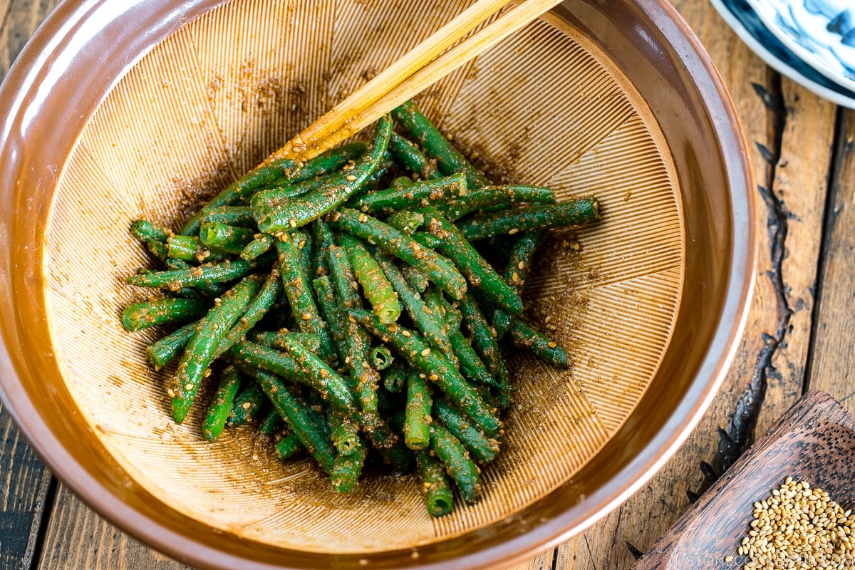 Blue and white Japanese bowls containing Green bean Gomaae.