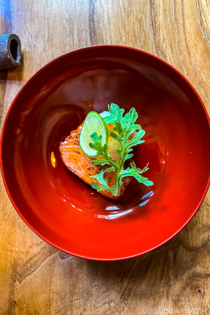 a piece of cooked salmon in a bowl