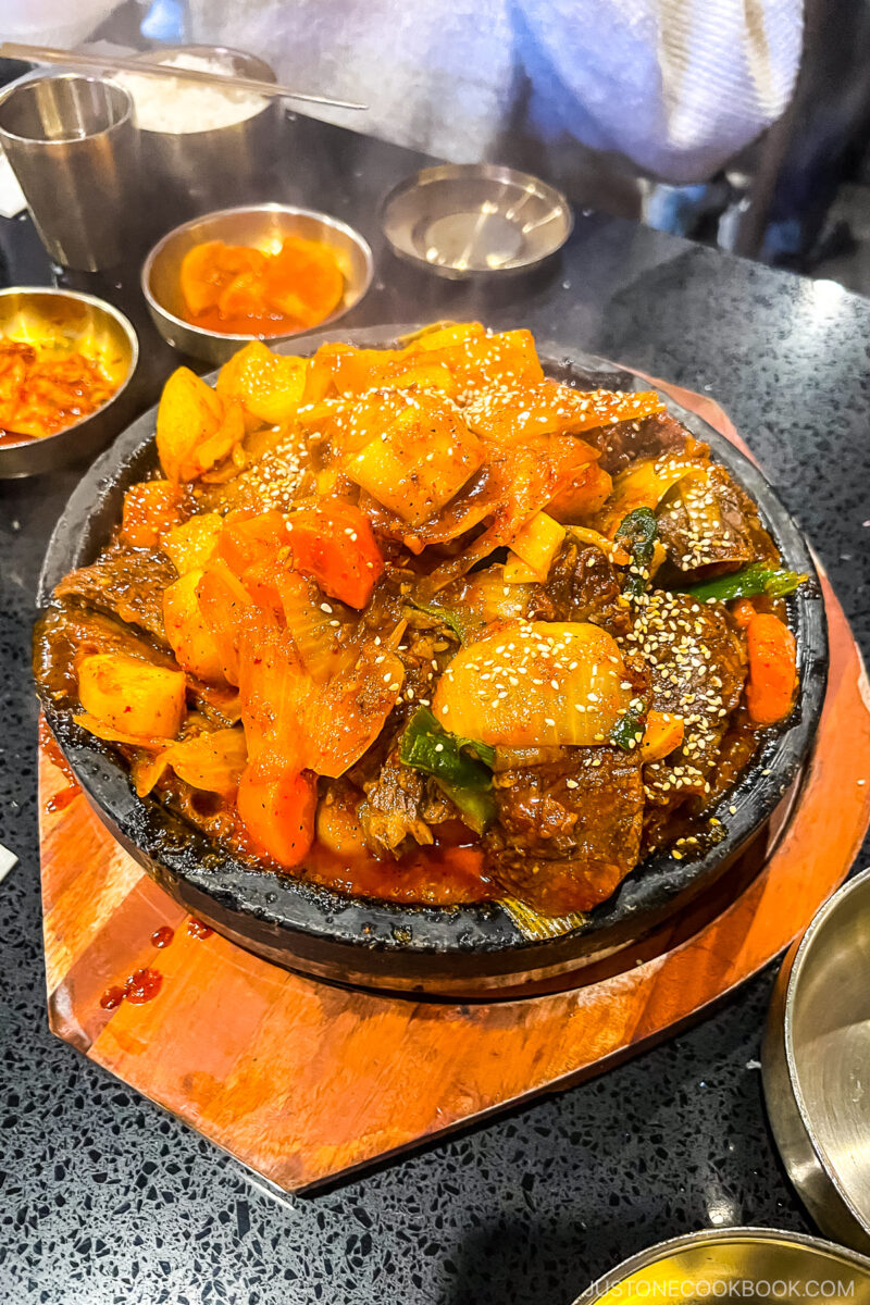 Galbi-jjim inside a hot stone bowl