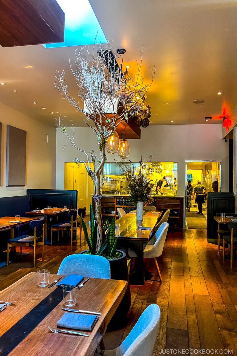 interior of a restaurant with tables and seating