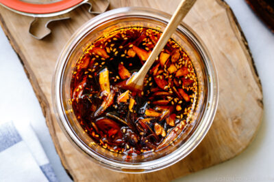 A Weck glass jar containing Crunchy Garlic Chili Oil (Taberu Rayu).