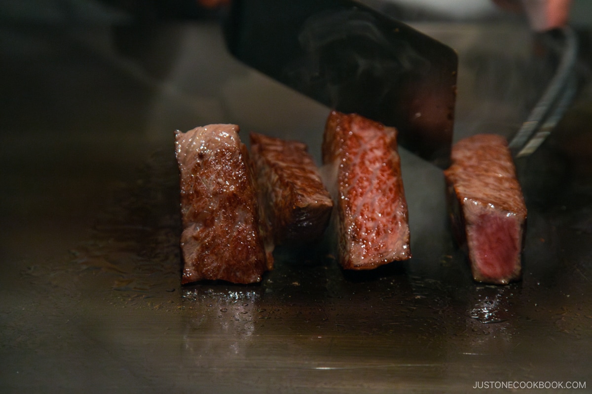 wagyu steak cooking on a skillet