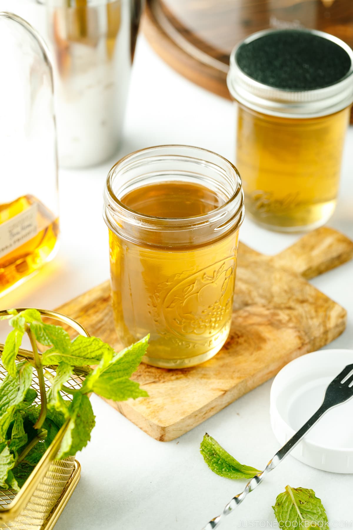 Mason jars containing homemade simple syrup.