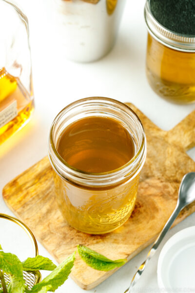 Mason jars containing homemade simple syrup.