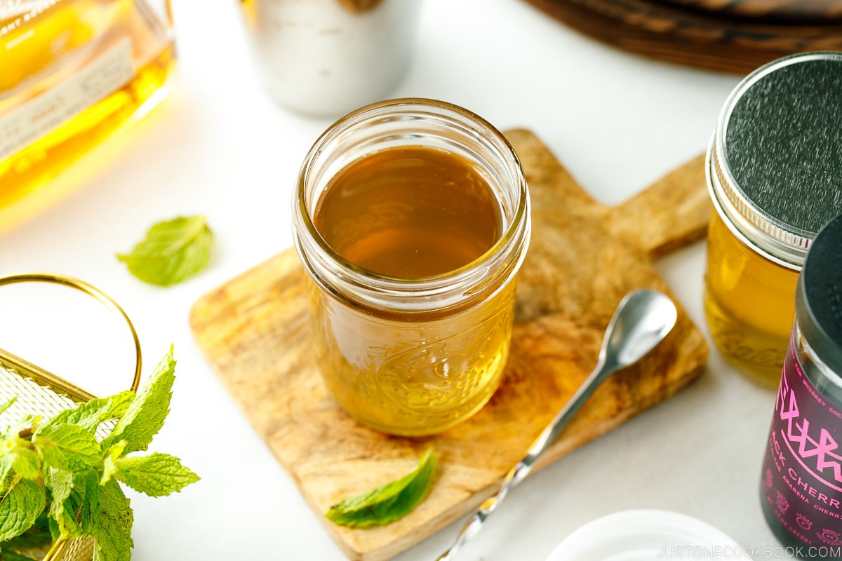 Mason jars containing homemade simple syrup.