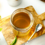 Mason jars containing homemade simple syrup.