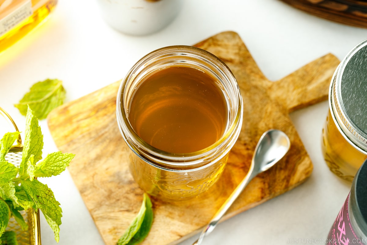 Mason jars containing homemade simple syrup.