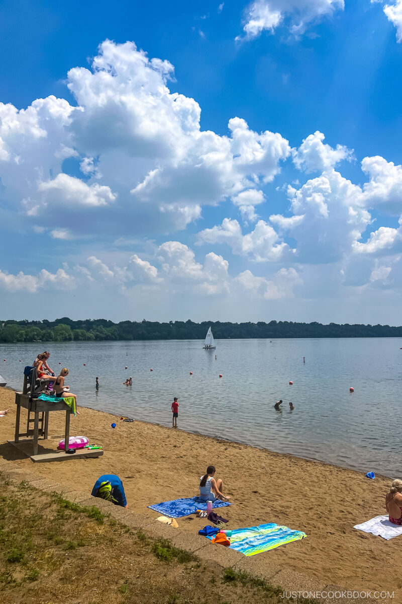 lifeguard and beach goers at Lake Harriet