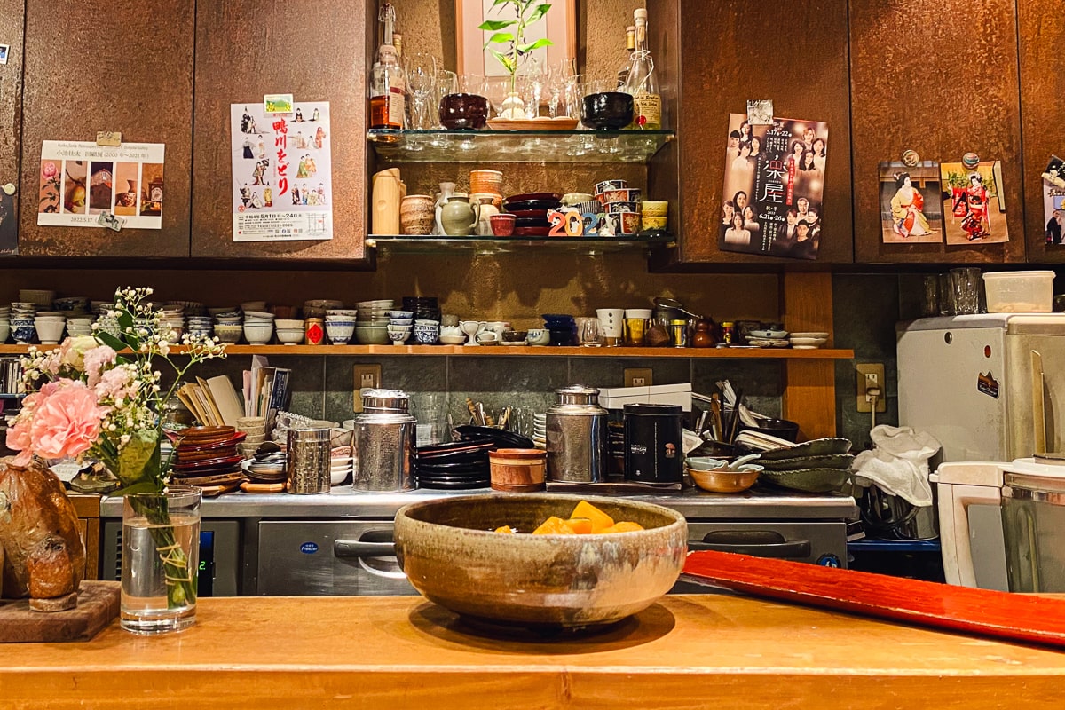a ceramic bowl on top of wood counter