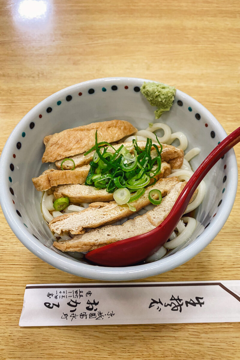 udon with tofu in a white bowl