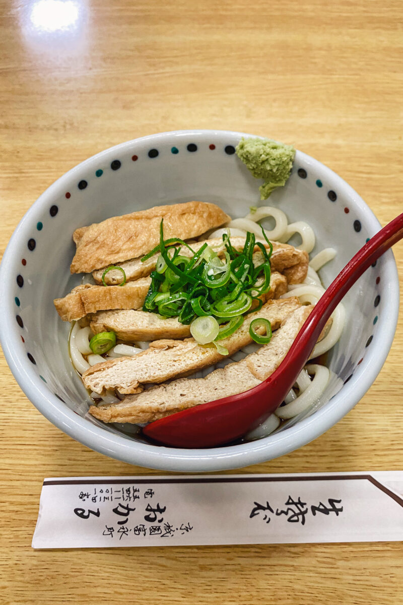 udon with tofu in a white bowl