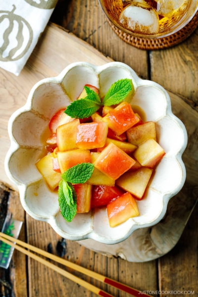 A fluted bowl containing Pickled Watermelon Rind.