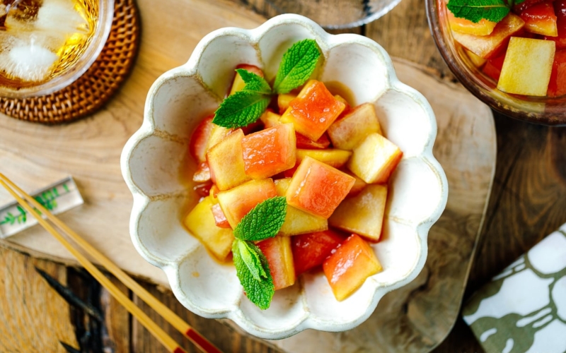 A fluted bowl containing Pickled Watermelon Rind.