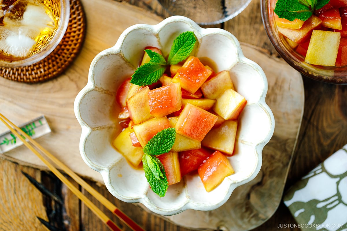 A fluted bowl containing Pickled Watermelon Rind.