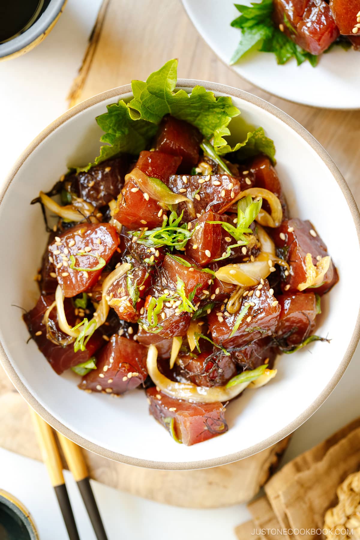 A white bowl containing Ahi Tuna Poke.