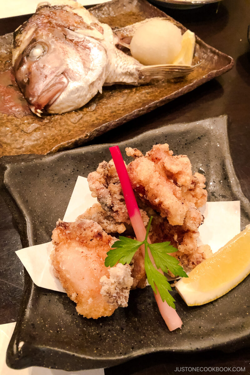 fried dish next to grilled fish head