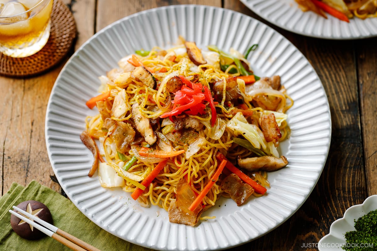 A fluted plate containing Yakisoba (Japanese Stir-Fried Noodles).