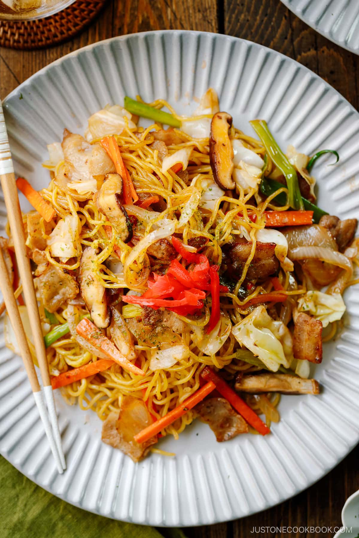 A fluted plate containing Yakisoba (Japanese Stir-Fried Noodles).