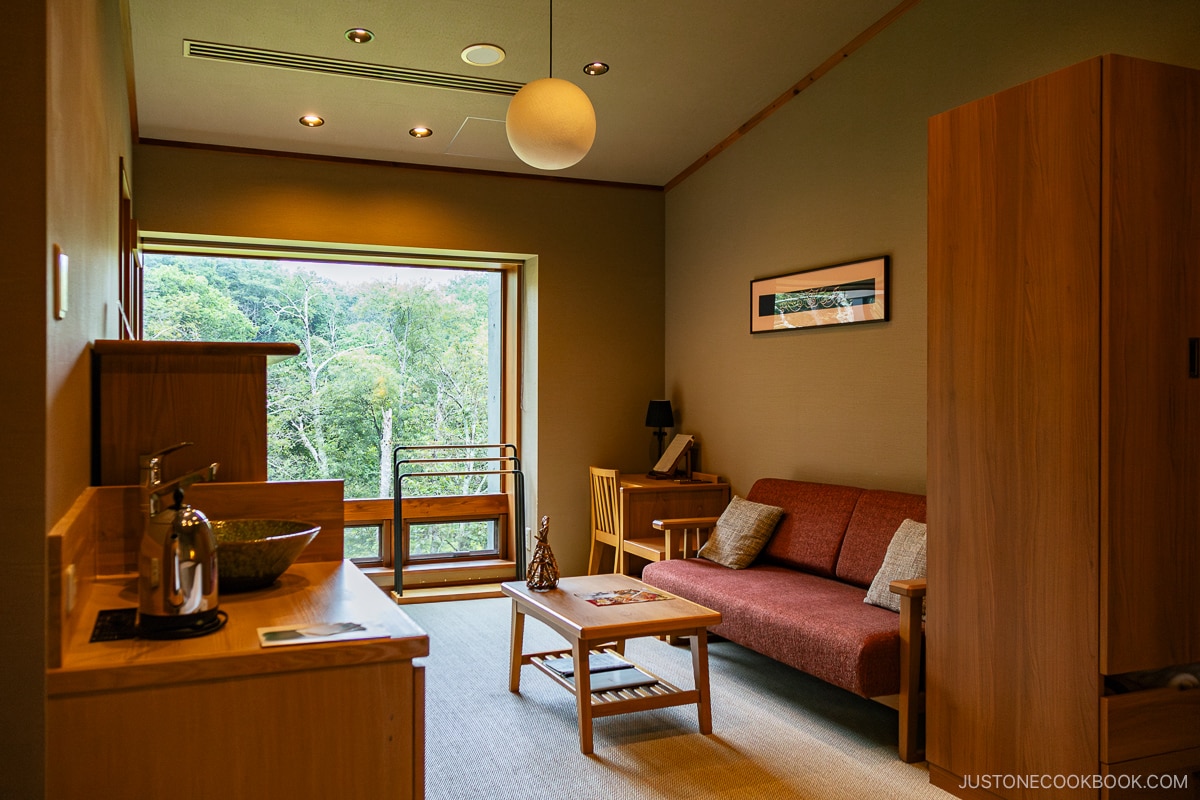 Hotel & Spa Resort La Vista Akangawa Kushiro room seating area and outside view