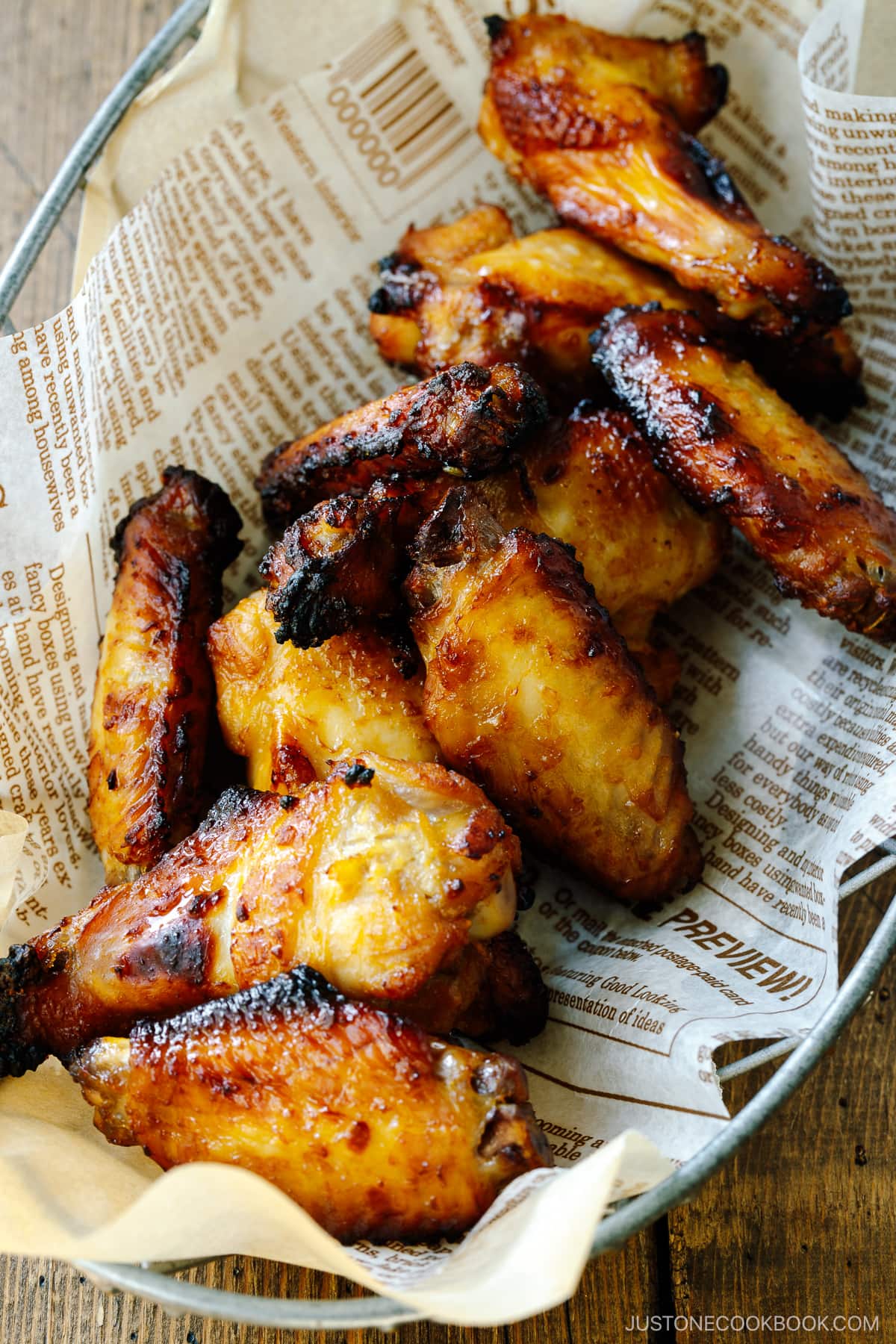 A wire backset cantaining Garlic Miso Chicken Wings.